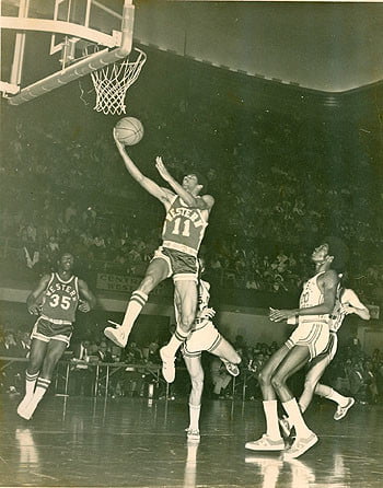 Larry “Go-Go” Grant scores with a lay-up. Photo by Phil Parish