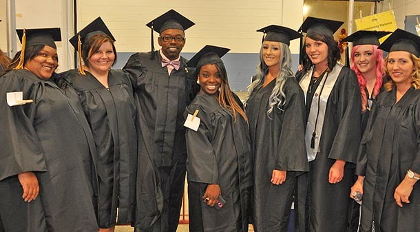 A-B Tech students getting ready to walk the stage at the U.S. Cellular Center during commencement exercises.   Photo: A-B Tech