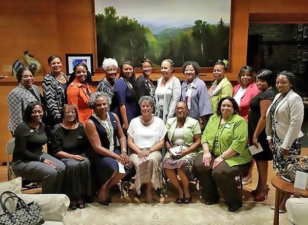 Standing (L-R): Elaine R. Beattie, Myrna Casey, Maia Collier, Charlotte Cato, Terry Bellamy, Jewel Wilson, Sharon Pitts, Jacqueline Nightingale, Marion Thompson, Jacqueline Baker, Je’wana G. McEachin, and Dahlia Hylton. Seated: Raynetta Waters, Gloria Gilliam, Sharon West, Diane Mance, Viola Spells, and Carol Goins. Photo: Urban News