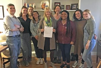 Warren Wilson College students and faculty joined President Lynn M. Morton, PhD, as she signed the Carbon Pricing Endorsement Letter. Pictured (L-R): Dr. Alfredo Rosete, Rayna Berger, Vivian Mills, Anna Johnson, President Morton, Dr. Amy Knisley, Brittany Sings, Maggie Hollar, Emily Oostveen. Photo: Steffi Rausch