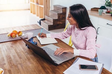 woman working on laptop computer