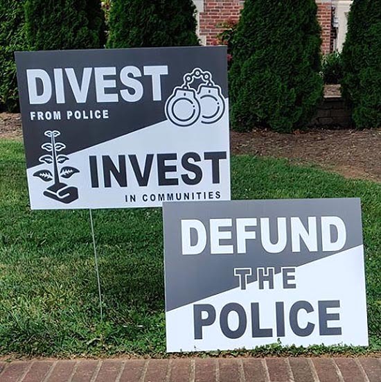 divest invest yard signs