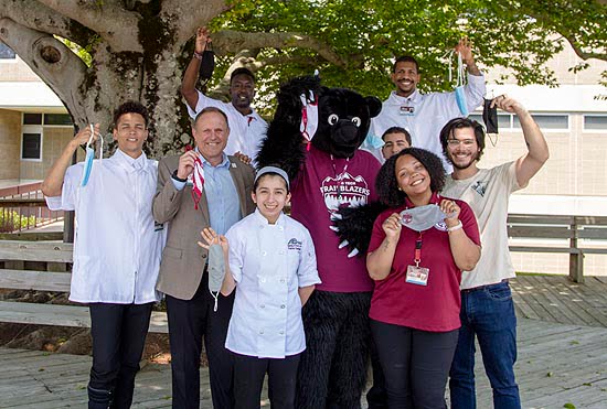 A-B Tech Students and employees remove their masks