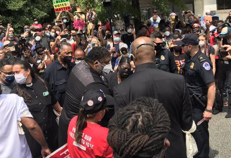 Capitol Police arresting Rev. Barber and Rev. Jesse Jackson outside the Hart Senate building.