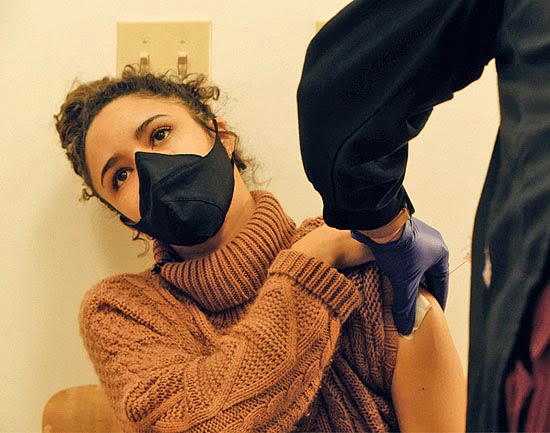 Sydney Hall gets vaccinated in the documentary  This Body.  Photo courtesy of PBS/Reel South