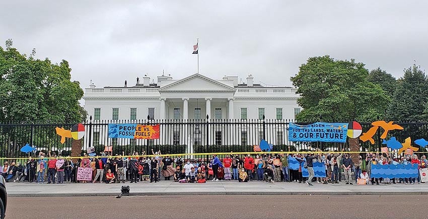 Indigenous leaders, people of faith, and other allies protest at the White House during the People Vs Fossil Fuels action.