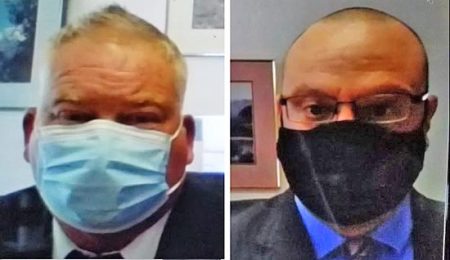 Robert Tucker, left, and his attorney, Peter Henry