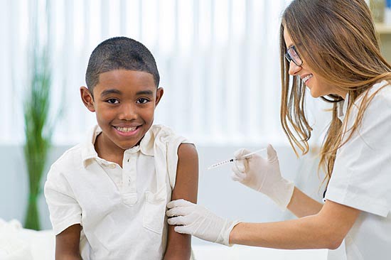 boy gets vaccinated