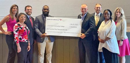 Representatives from Bank of America present a check for $150,000 to support A-B Tech’s STEP Program.