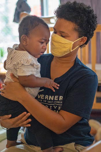 woman caring for child