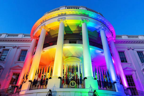 The White House was lit in the colors of the rainbow for the signing ceremony.