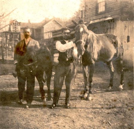 Isaac Dickson with nephew James Wilson standing in front of his home at 133 Valley Street (late 1800s). Photo courtesy of Black Highlanders Collections, D. Hiden Ramsey Library Special Collections, UNCA.