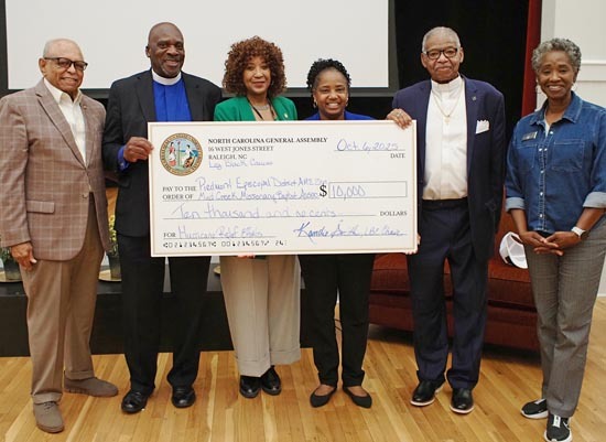 NC Black Caucus w check PA060887