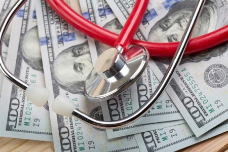 stethoscope on money 900