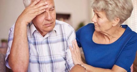 white worried elderly couple