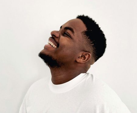 black man laughing