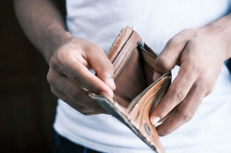 biz-man with empty wallet