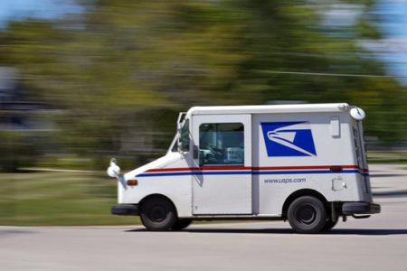 usps mail truck blur